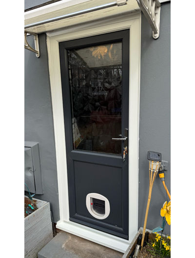 Grey UPVC door with catflap