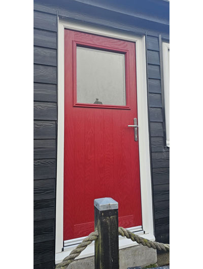 Red cottage style composite back door with large square glass panel