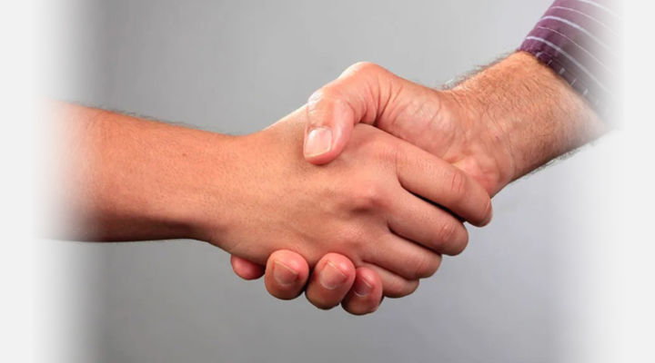 Handshake between two people
