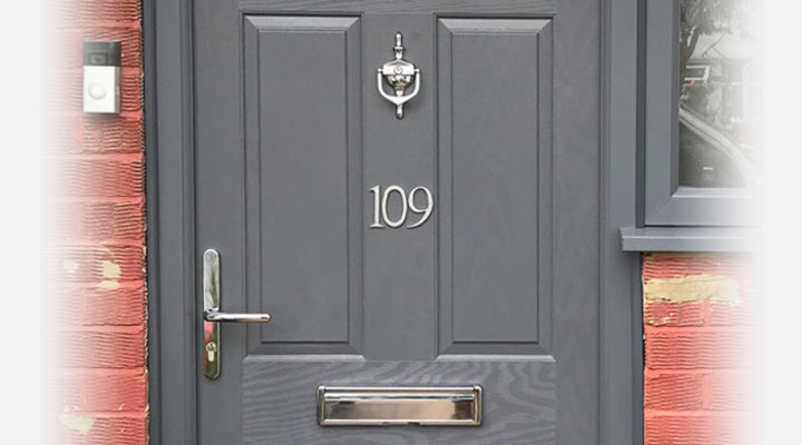 Slate grey composite front door with chrome hardware