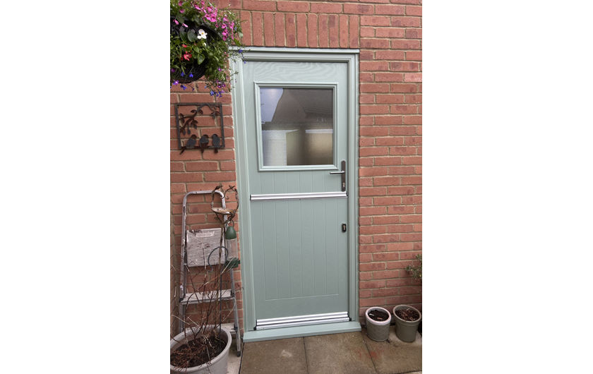 A Sutton composite stable door in chartwell green