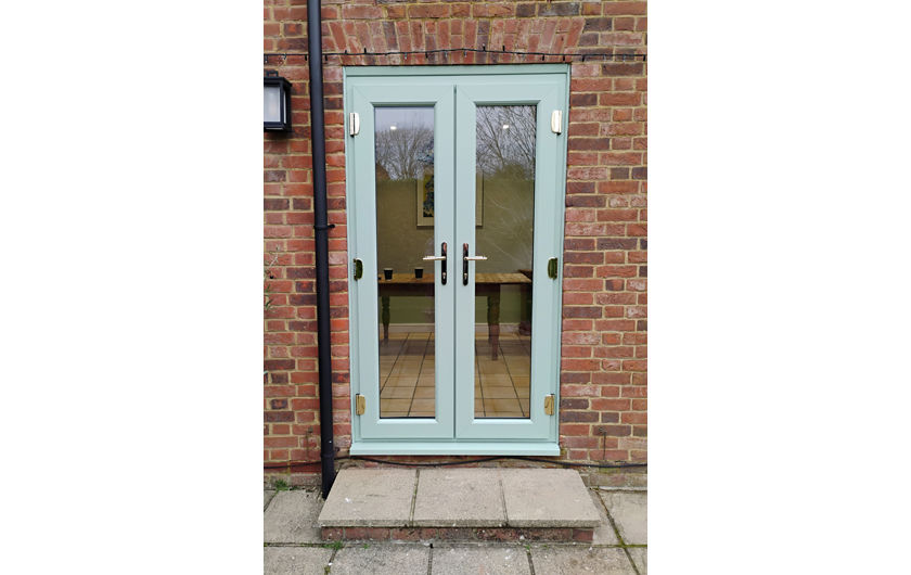 Chartwell green coloured UPVC fully glazed french doors