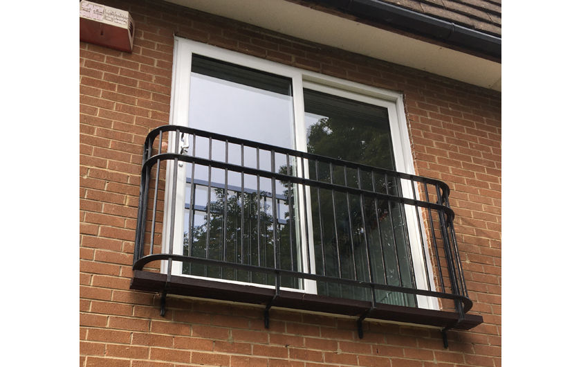 UPVC sliding patio doors within a balcony
