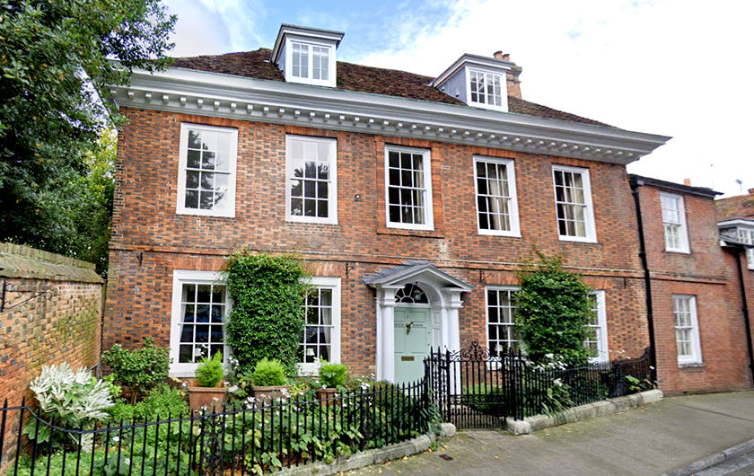 Georgian style house with grilled sliding sash windows