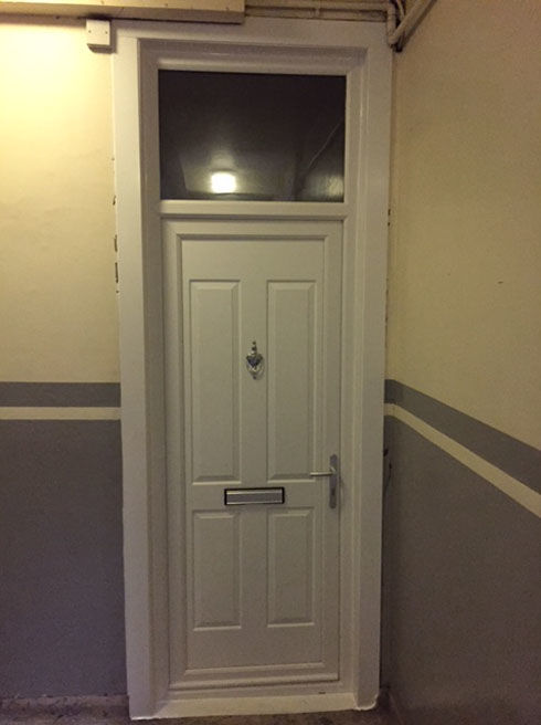 Leeds Solid white upvc front door with toplight