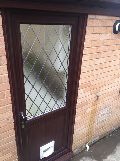 Cardiff Diamond Lead mahogany upvc back door with catflap