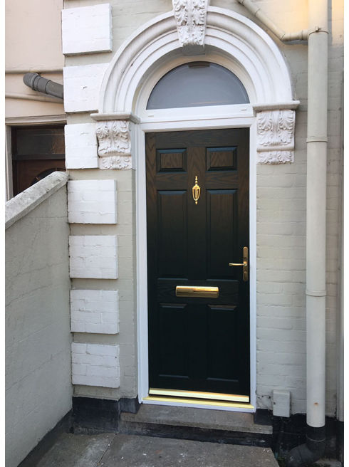 Kent green composite front door with arched toplight