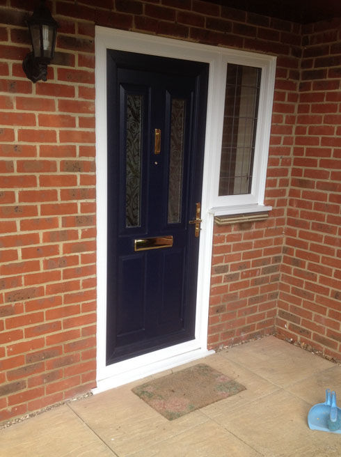 Leeds Sella blue upvc front door with flag window