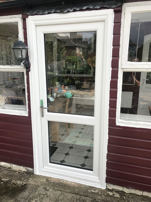 Fully Glazed with Midrail white upvc back door