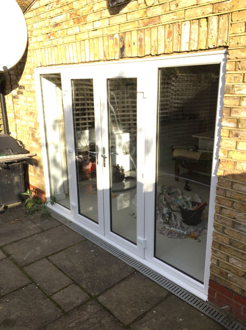 White upvc french doors with side panels