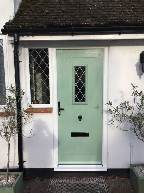 Cumbria Diamond Lead chartwell green composite front door with flag window