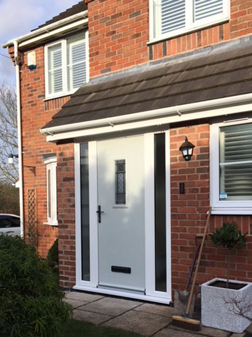 Cumbria Victoriana pebble composite front door with side panels