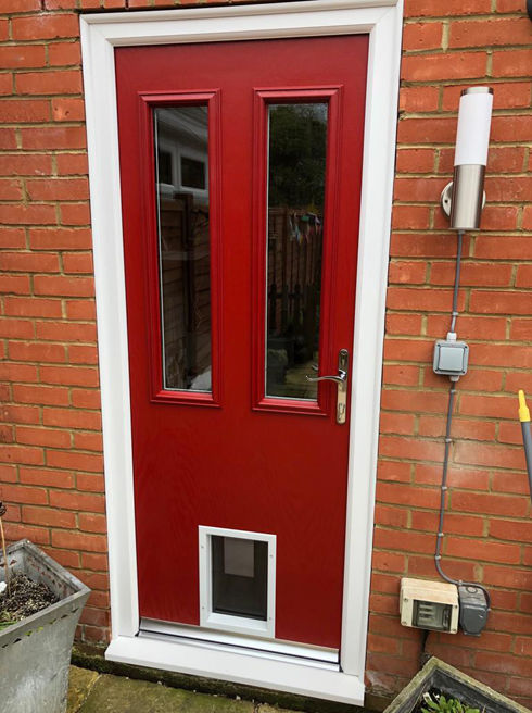 Dartford Anice red composite back door with pet door